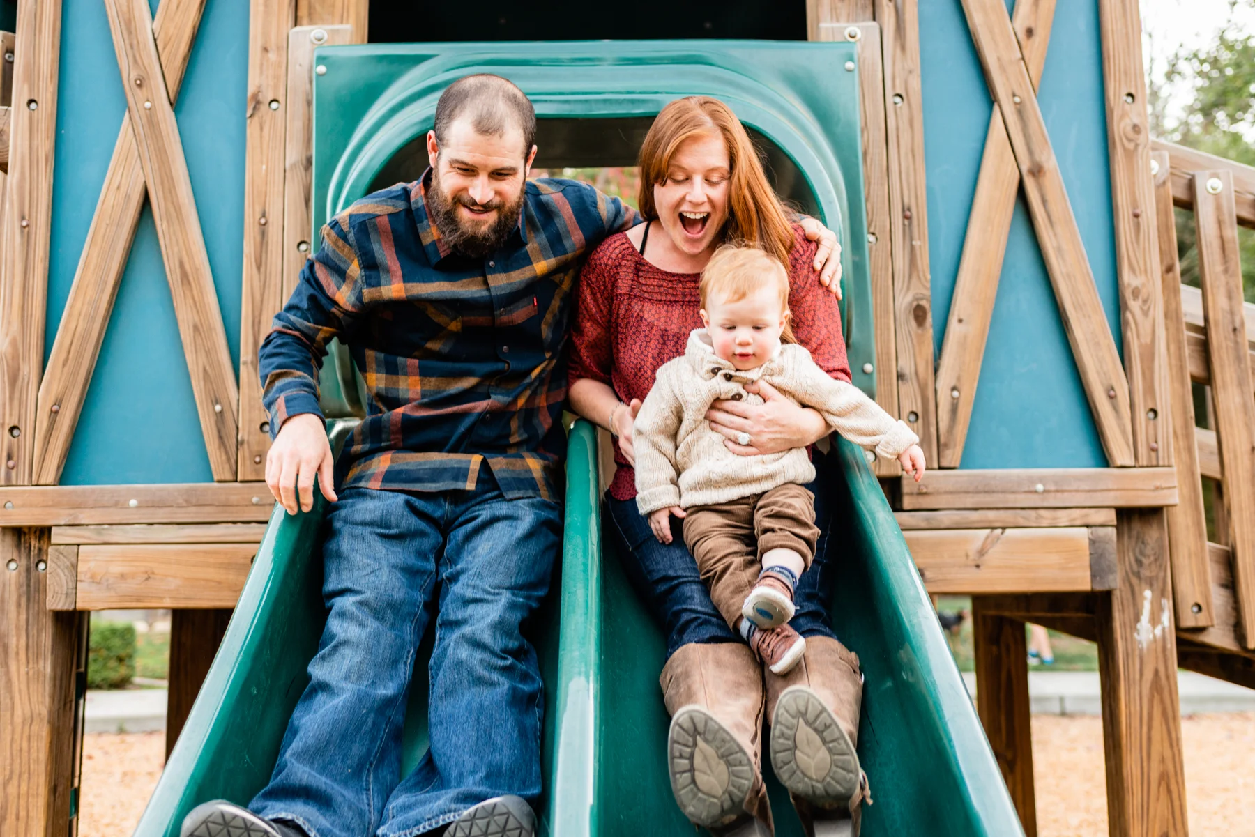 Fun at the playground at a family lifestyle session at Hap Magee Park