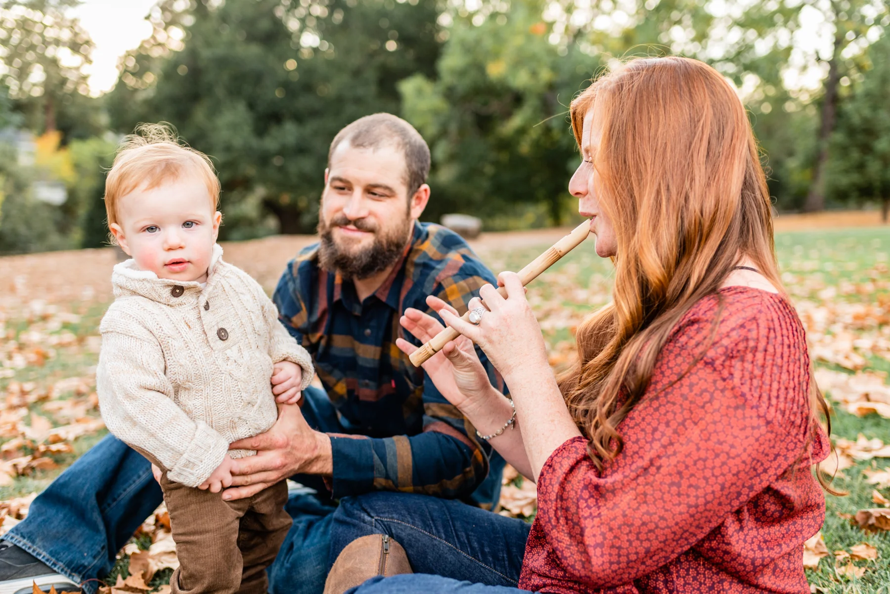 Family portrait during fall at Hap Magee Park.