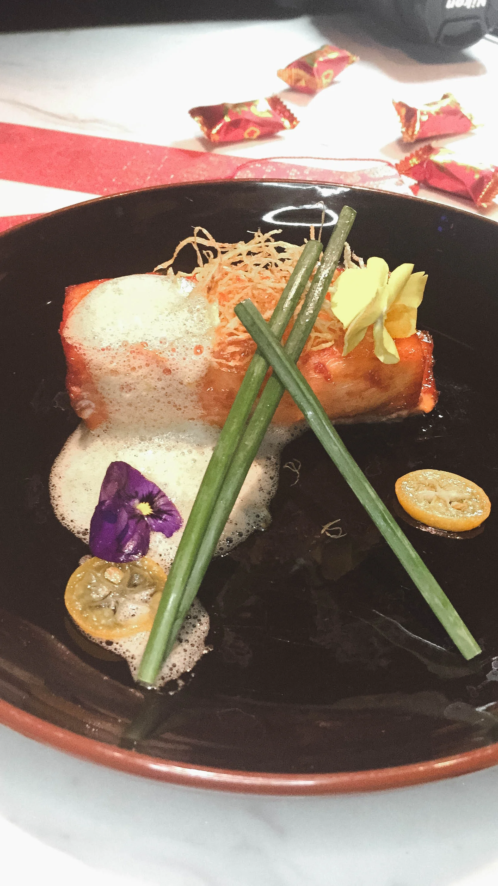 Baked Chilean sea bass with Kumquat glaze