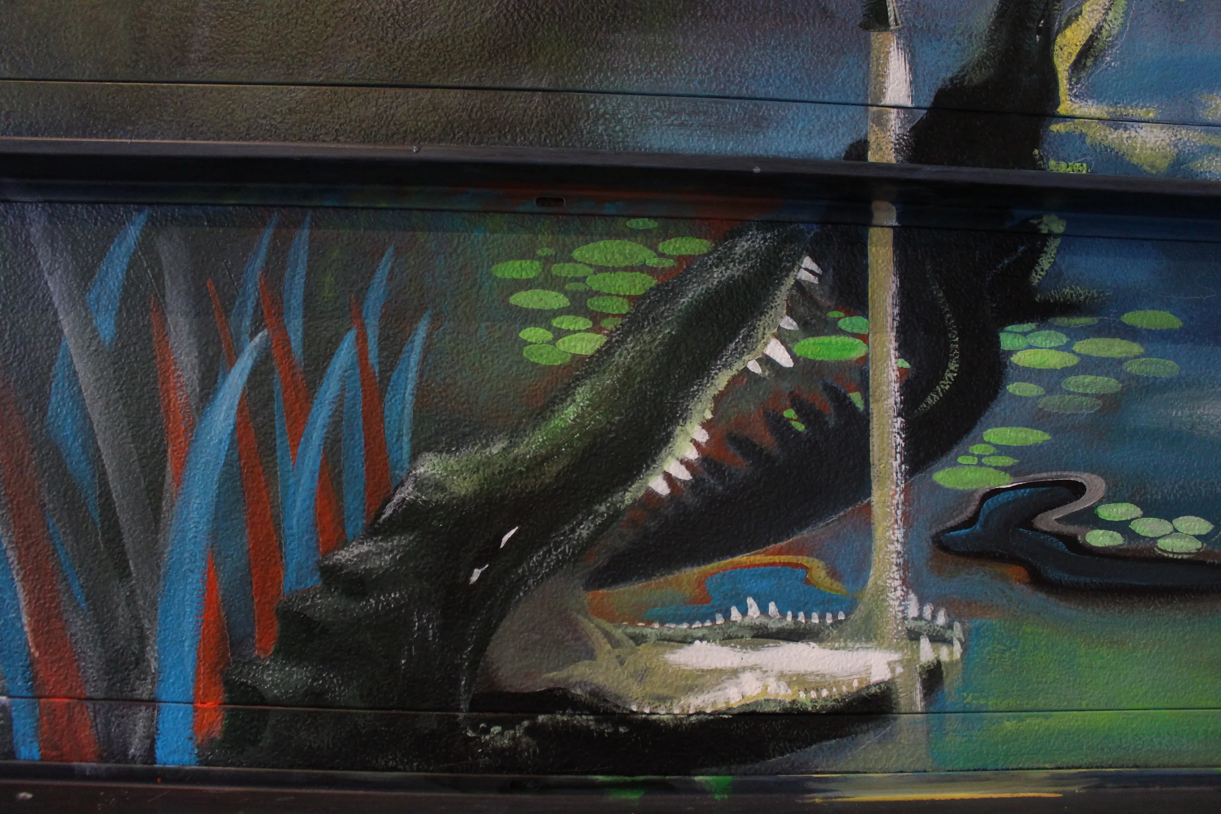 Detail of gator drinking from beer tap for bar mural