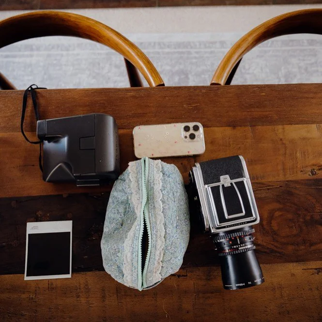 Got the essentials covered?? This bridesmaid definitely had. Polaroid check, film camera check and IPhone a check.
