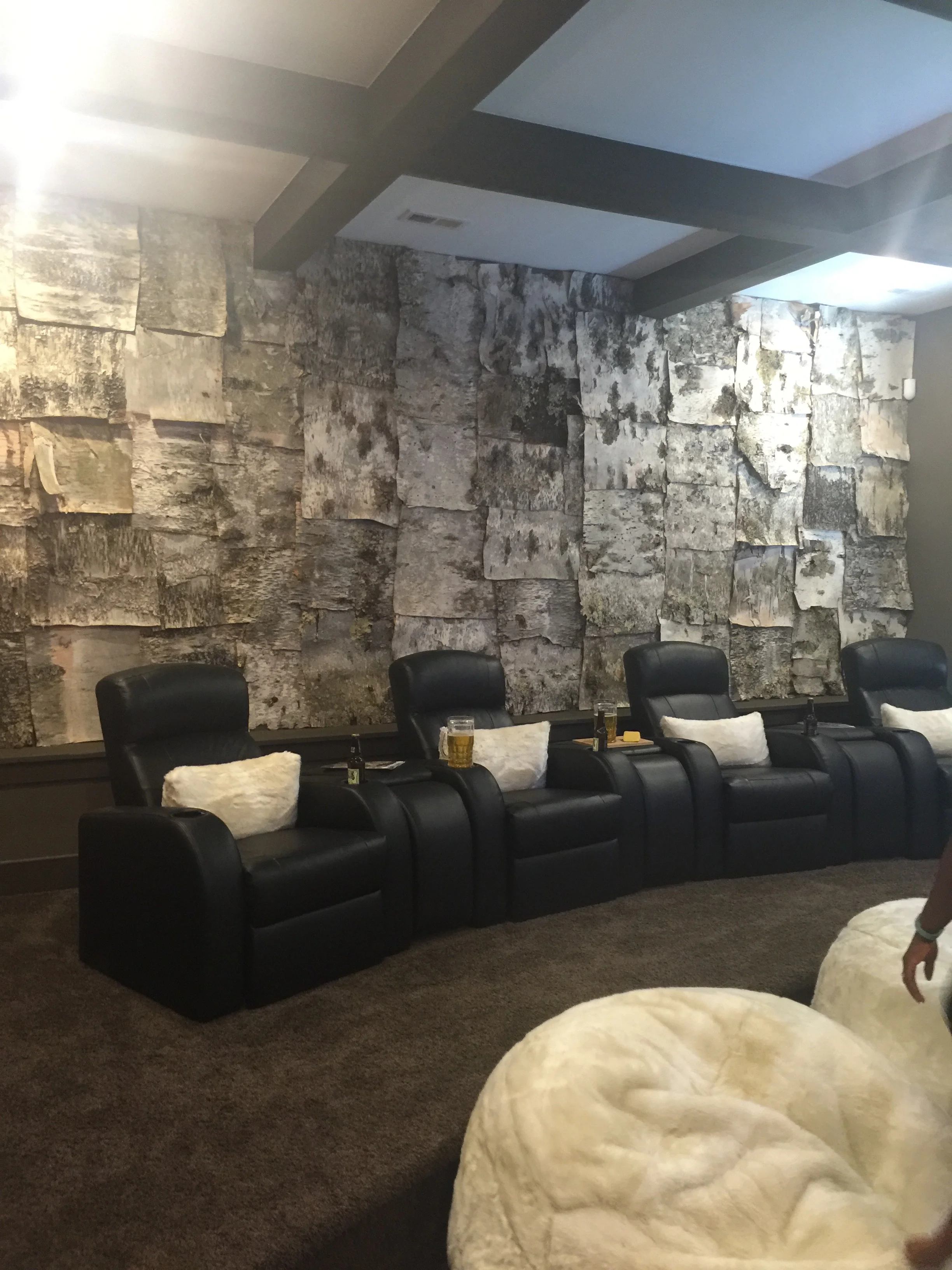 This media room (and this Fisher Home), was may favorite of the Parade of Homes. Bark walls, along with large pictures of Famous Actors (one the left side of the room), with a Huge TV above a super cool fireplace. Just the kind of room that I could spend hours in watching classic old movies, and of course, 
