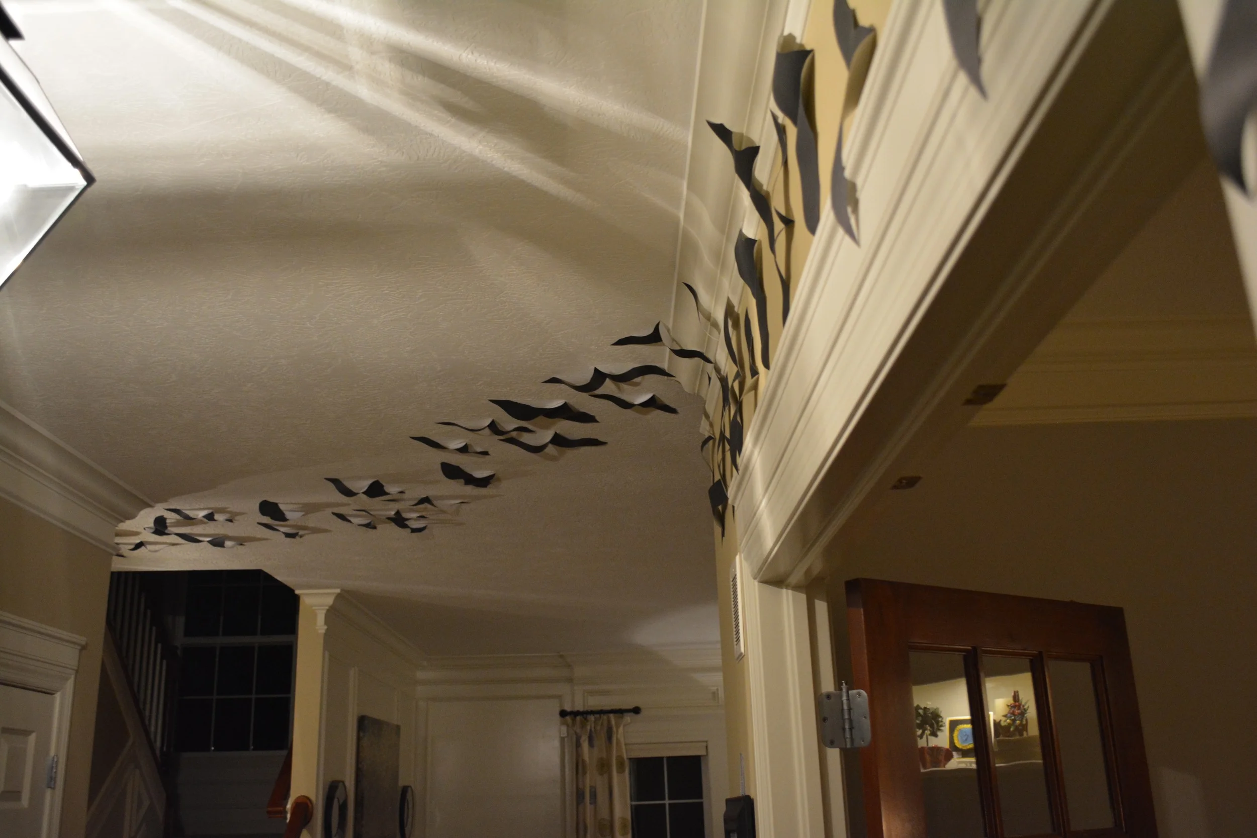I thought I'd share our last year's theme, we nick-named our home "the Bat Cave" ~ we had a trail of bats from the entry way, clear through the hallway and into the Kitchen! 