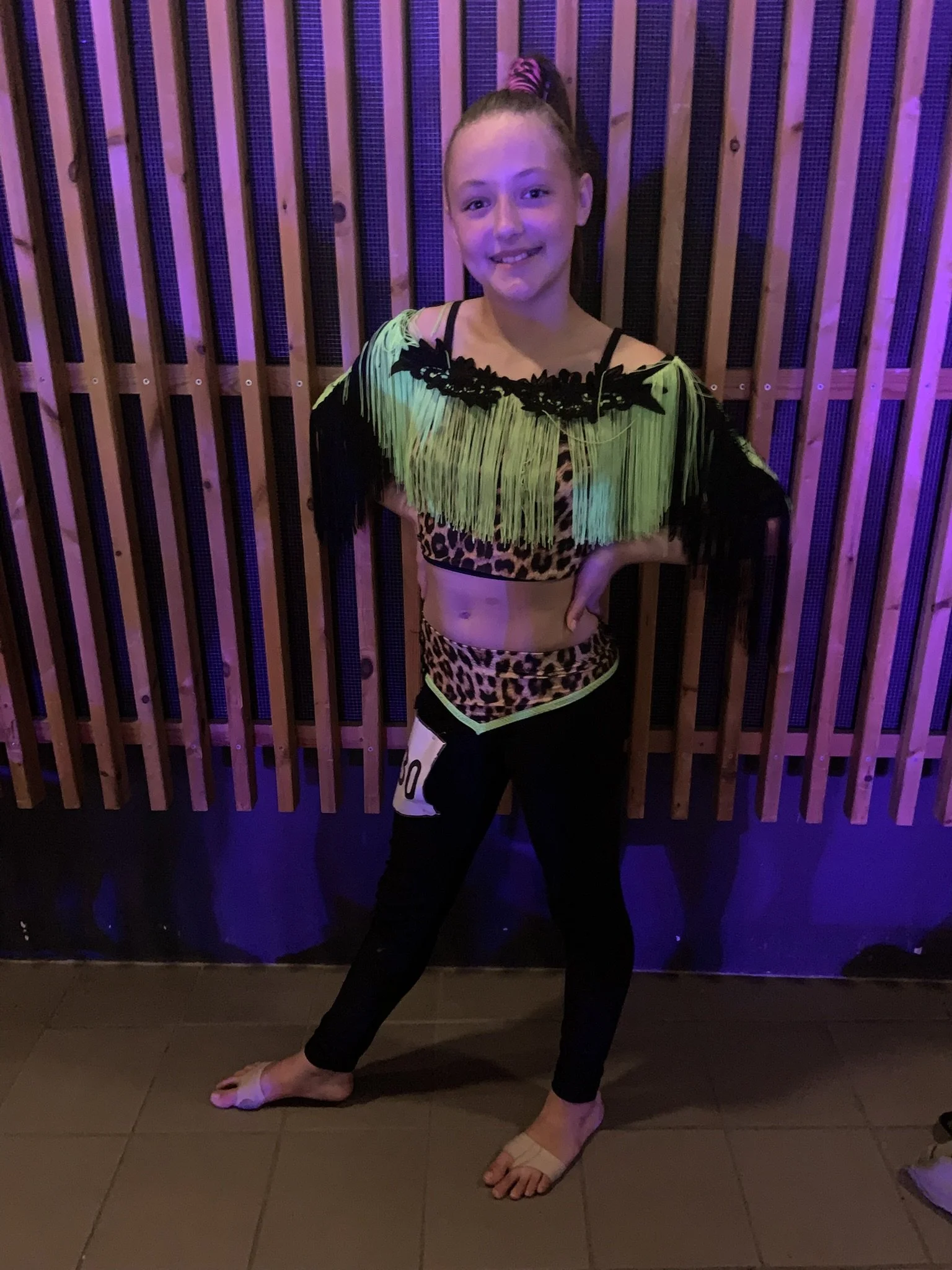 Danser fra Dansefeber i grøn discodragt til disco solo ved Danmarksmesterskaberne 2026 i Forum Horsens