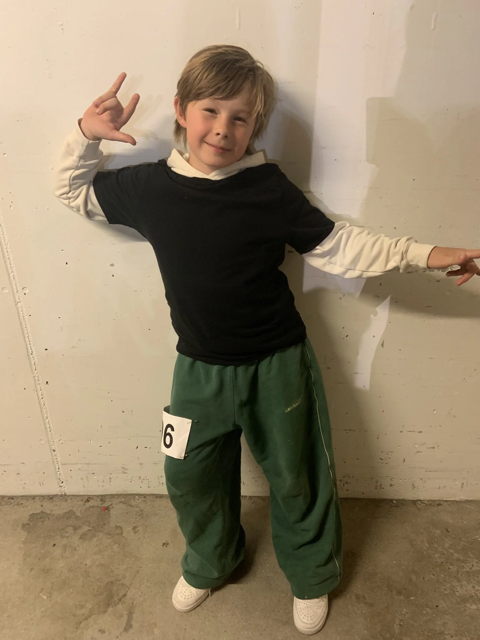 Danser fra Dansefeber i grøn outfit til hiphop solo ved Danmarksmesterskaberne 2026 i Forum Horsens