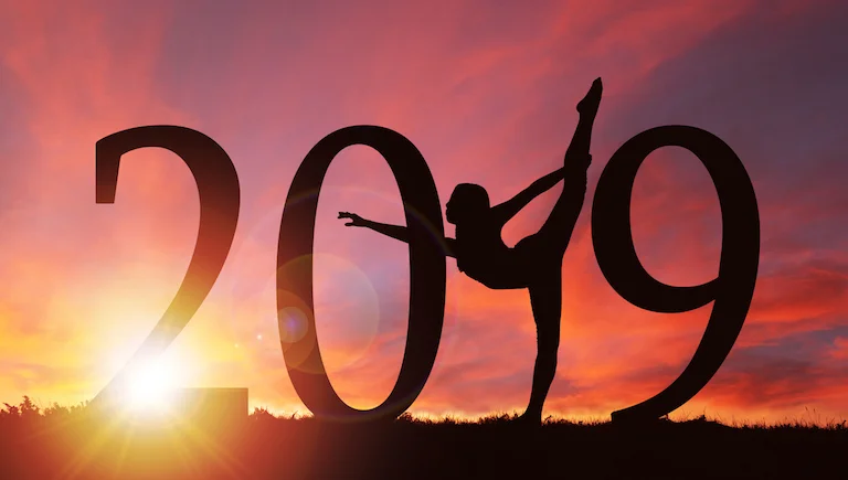 2019-yoga-pose-on-sunset-2019-wellness-trends-healthista.com-main-image-.jpg