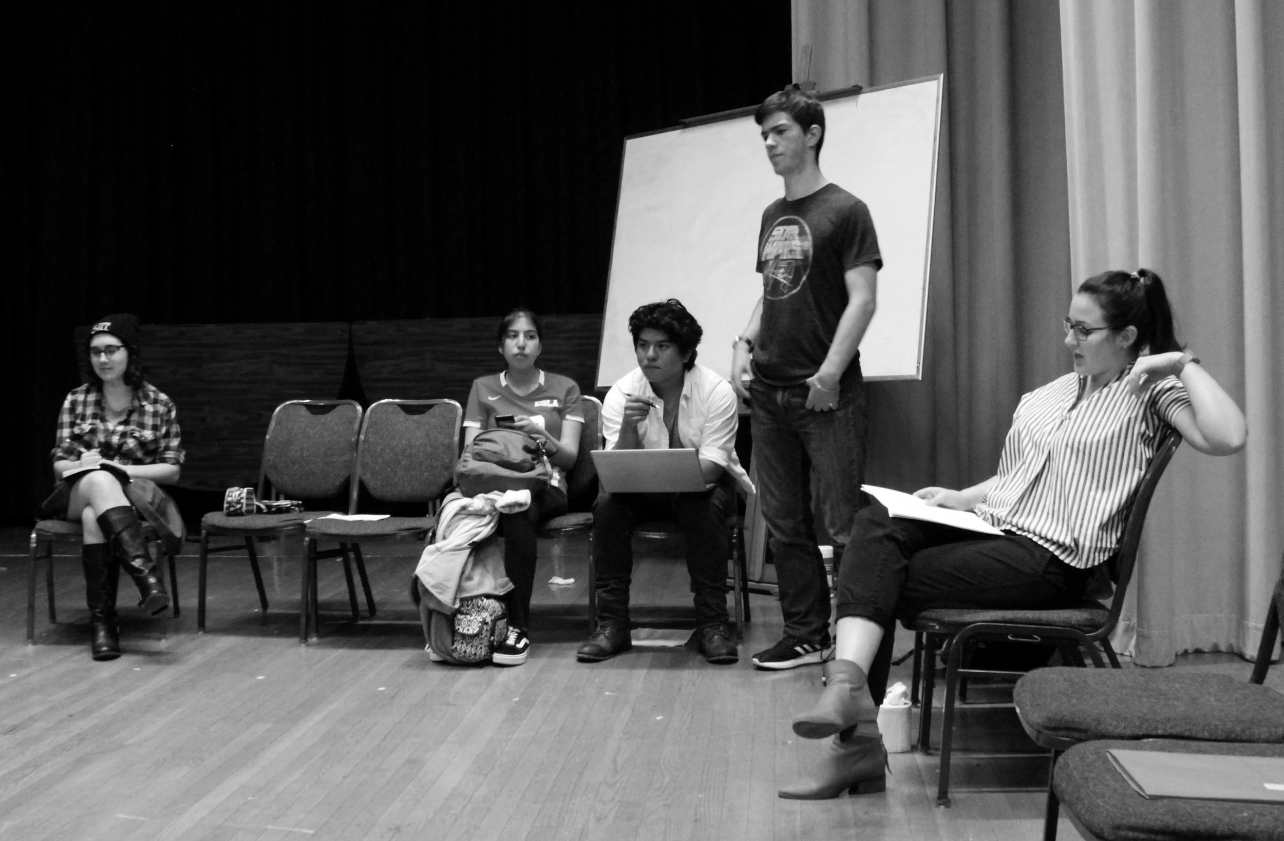 Whodunit? Students continue rehearsal for Agatha Christie’s The Mousetrap.