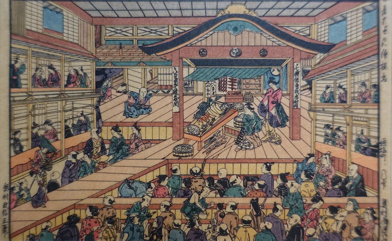 25-6 1937 reproduction of a woodblock print of a kabuki theatre by Okamura Masano, Edo Period. 3 1/2 x 5 1/2 inches. $90 Canadian