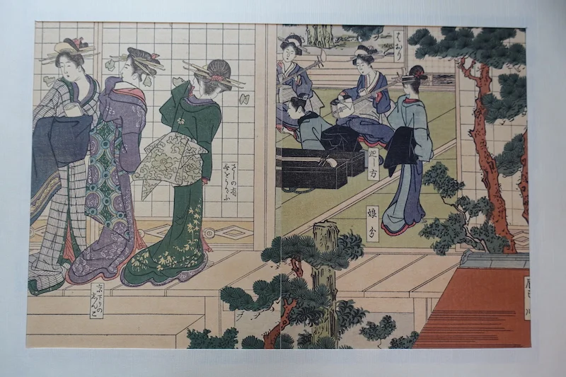 25-11 1916 reproduction of a woodblock print of a Geisha House by Toyonobu, Edo Period. 6 7/8 x 10 1/4 inches