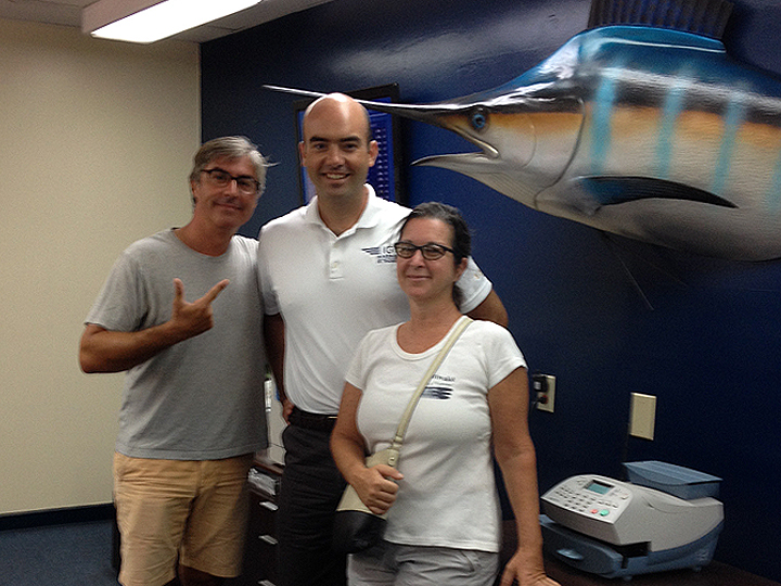 Pete, Mike, Deb, a marlin, and a postal machine.