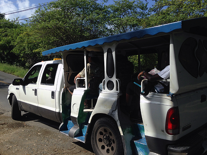 Safari bus. You hail it like a cab on the street and press a doorbell mounted on the ceiling to signal when your stop is coming up. It doesn't take long to figure out the (unpublished) routes. A bargain at $1.