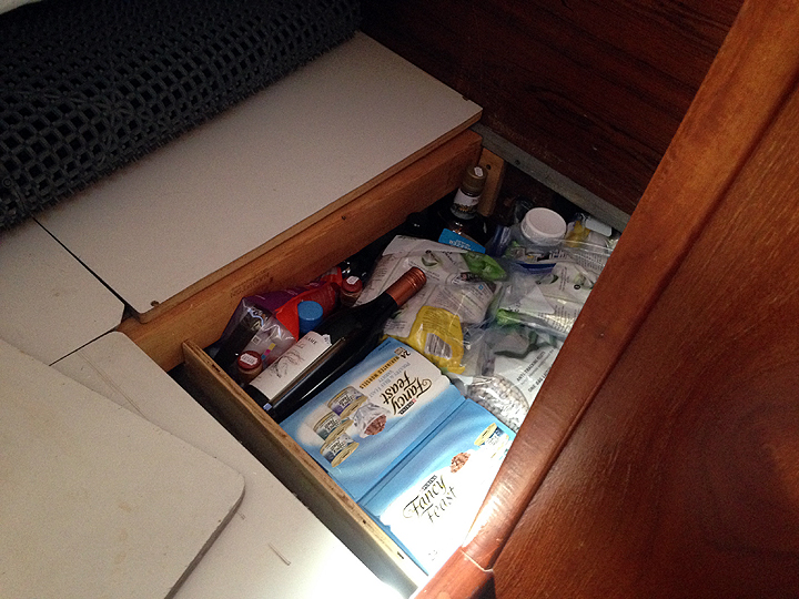 Under-berth storage. You'll notice that it's mostly cat food, wine, and rum.