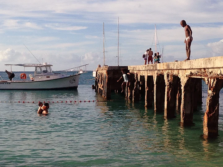 Local kids jumping off the commercial pier
