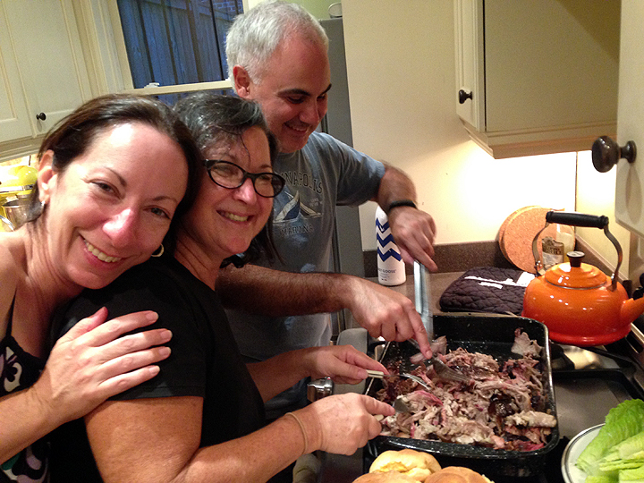Yvonne, Deb, and Onat pulling pork.