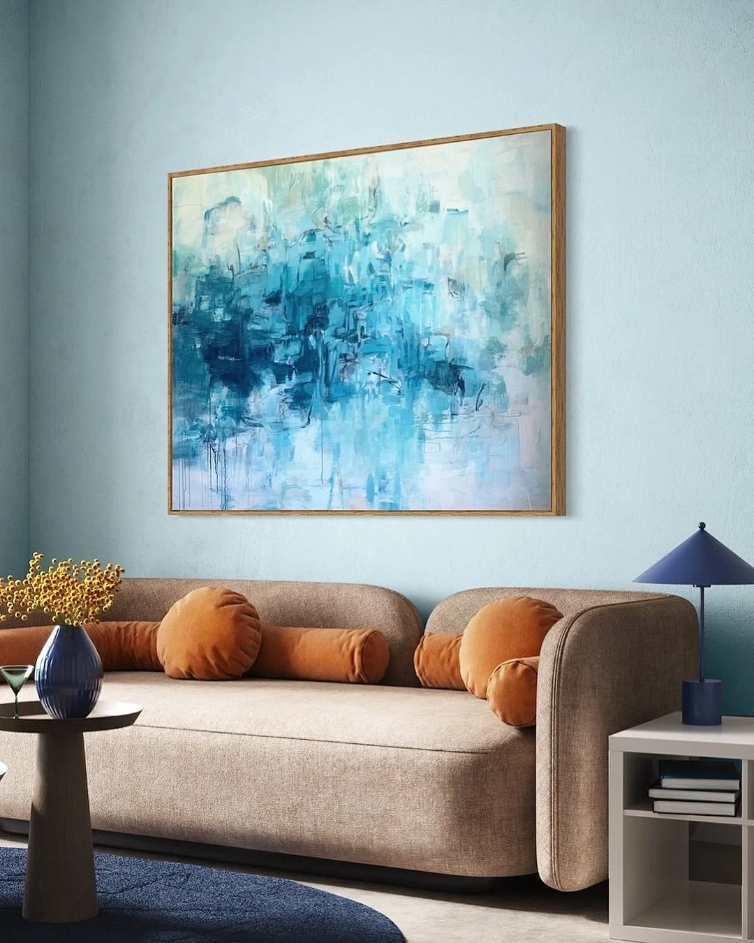 Layers of blue, light, and texture. This large 4’ x 5’ abstract painting almost ripples across the wall, changing with the light and the room around it.
Swipe for a closer look at the details. 
A piece like this feels at home in modern
