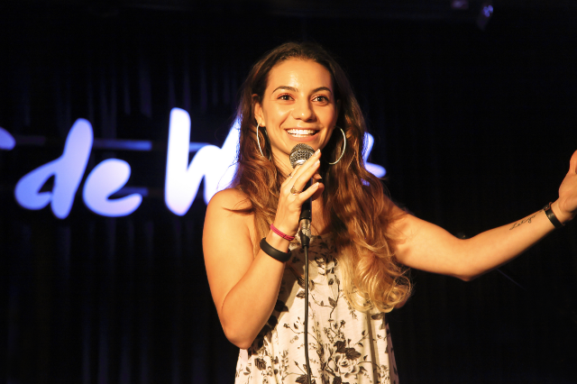 Liz onstage at Sidewalk cafe in new york city / photo courtesy liz miele