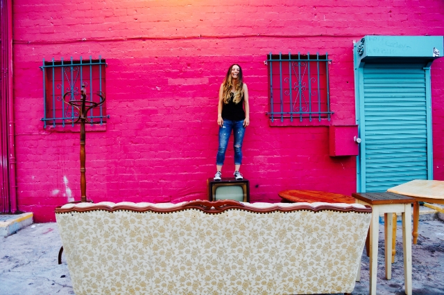 "Maria Shehata took this of me in LA in Echo Park. These people were moving to Portland and couldn't bring their furniture so they were dumping it behind this bookstore but decided to set it up like a living room." / Photo Courtesy Liz Miele