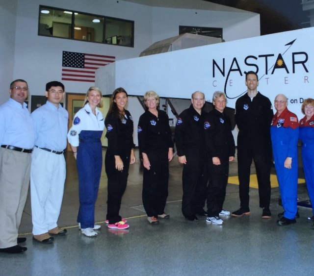 Normal
0
false
false
false
EN-US
X-NONE
X-NONE
The NASTAR training simulator, the instructors, and the future sub-orbital astronauts. MJ is fifth from the left (2013) / Photo Courtesy MJ MARGGRAFF