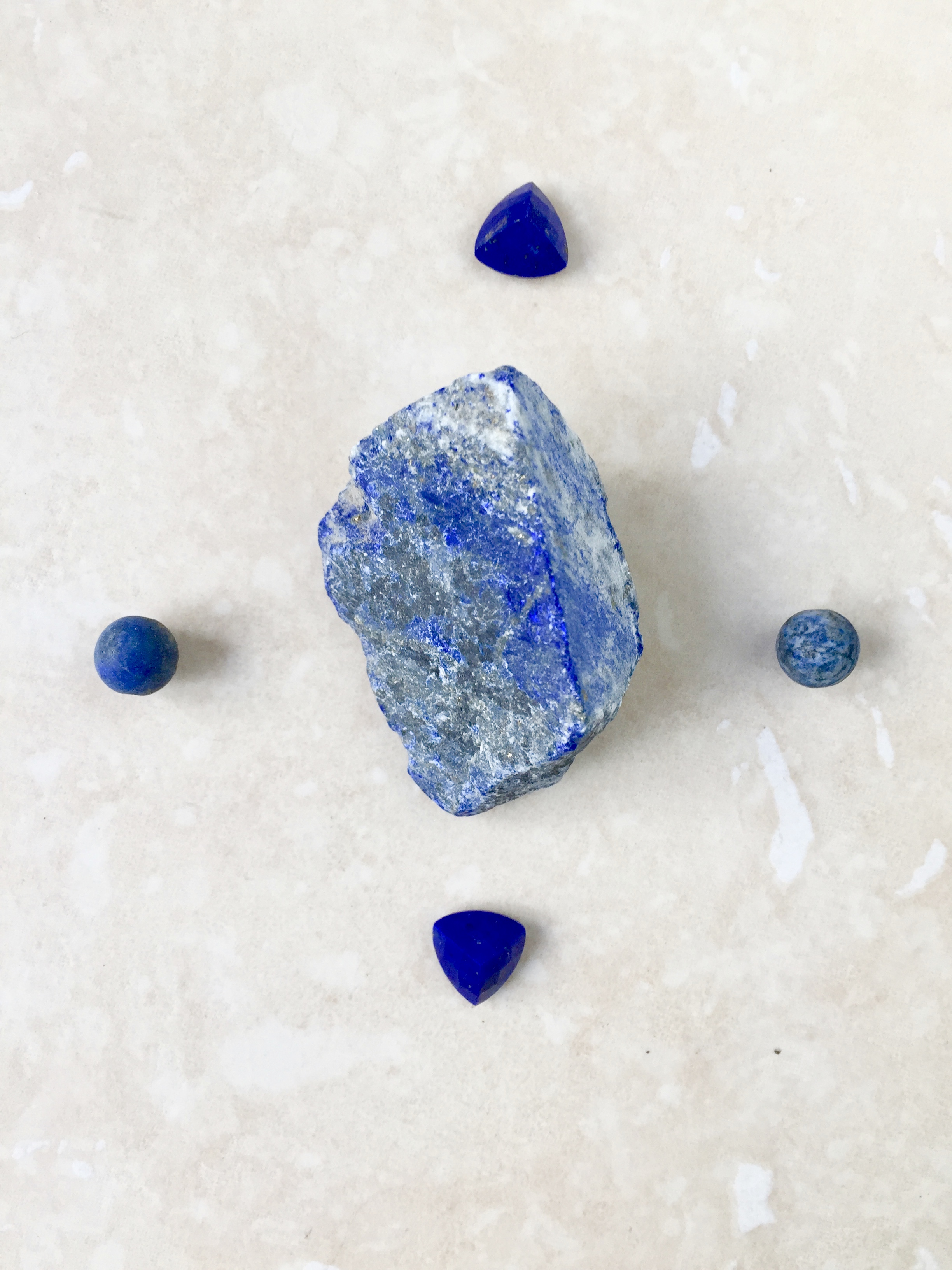 Lapis lazuli in raw, matte bead and polished gemstone varieties
