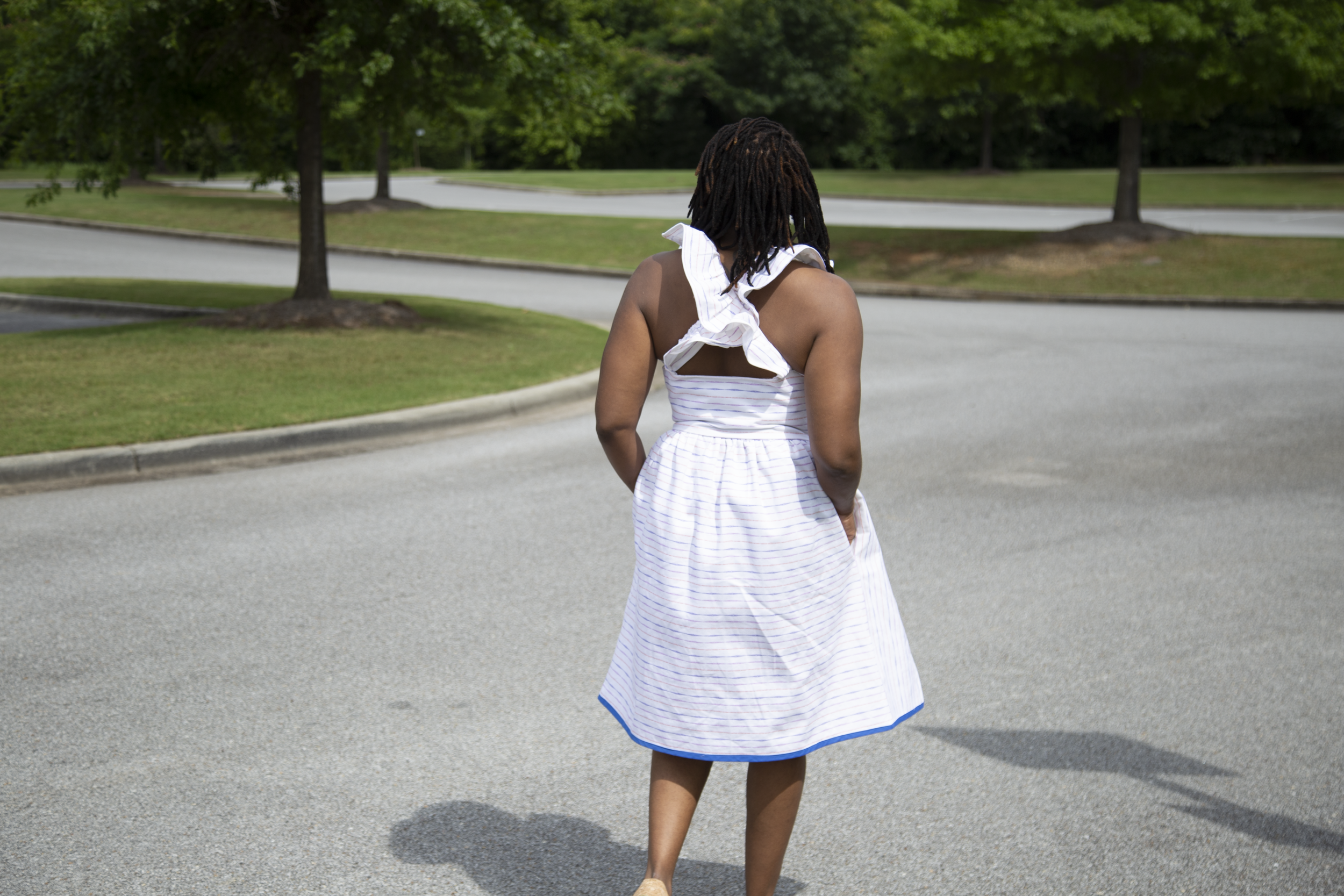 The crisscross ruffles give the dress a dramatic exit. 