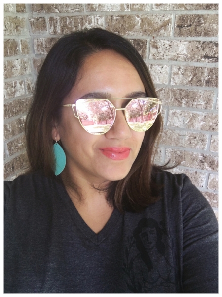 Tinted dry shampoo, mirrored sunglasses, and lightweight leather earrings in full effect!
