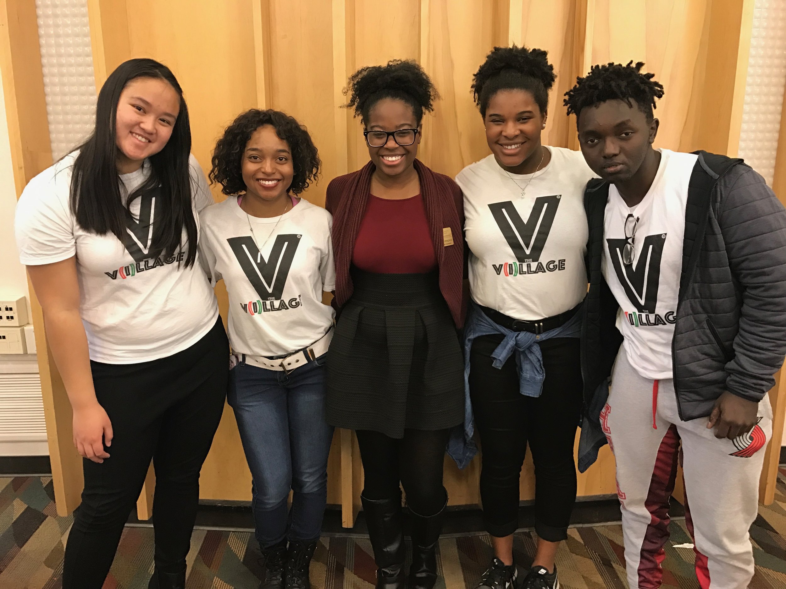 Pictured here are The V(i)llage ™ Ambassadors Janet Tran, Tierra Yancey, Alexis Baker and Patrick Muvunyi standing with program coordinator Natalie Pinkney. They are attending STEM U, our College Immersion Tour (2017) to the University of Utah. This annual event is an educational program designed to expose middle, junior and high school students to professions in the fields of science, technology, engineering, and math.