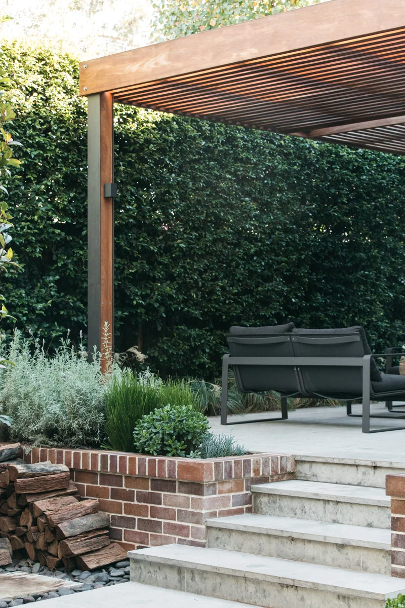 limestone courtyard with timber pergola.jpg