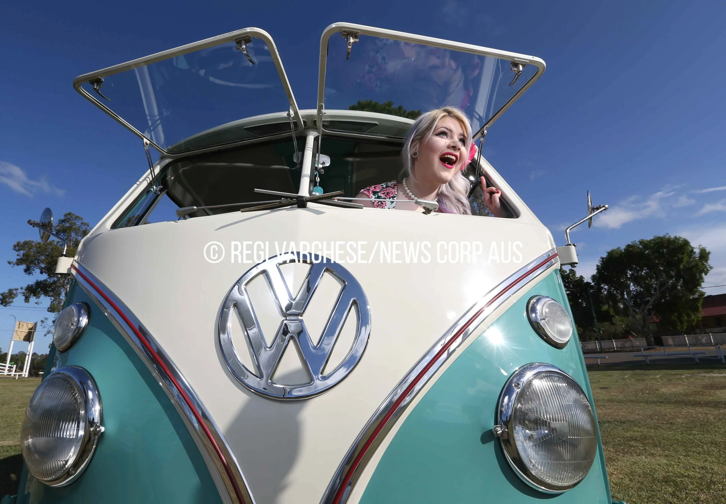 CHP_Export_99716838_Monique Marshall from Trash Monkeys in 50%27s Rockabilly costume in front of a 196.jpg