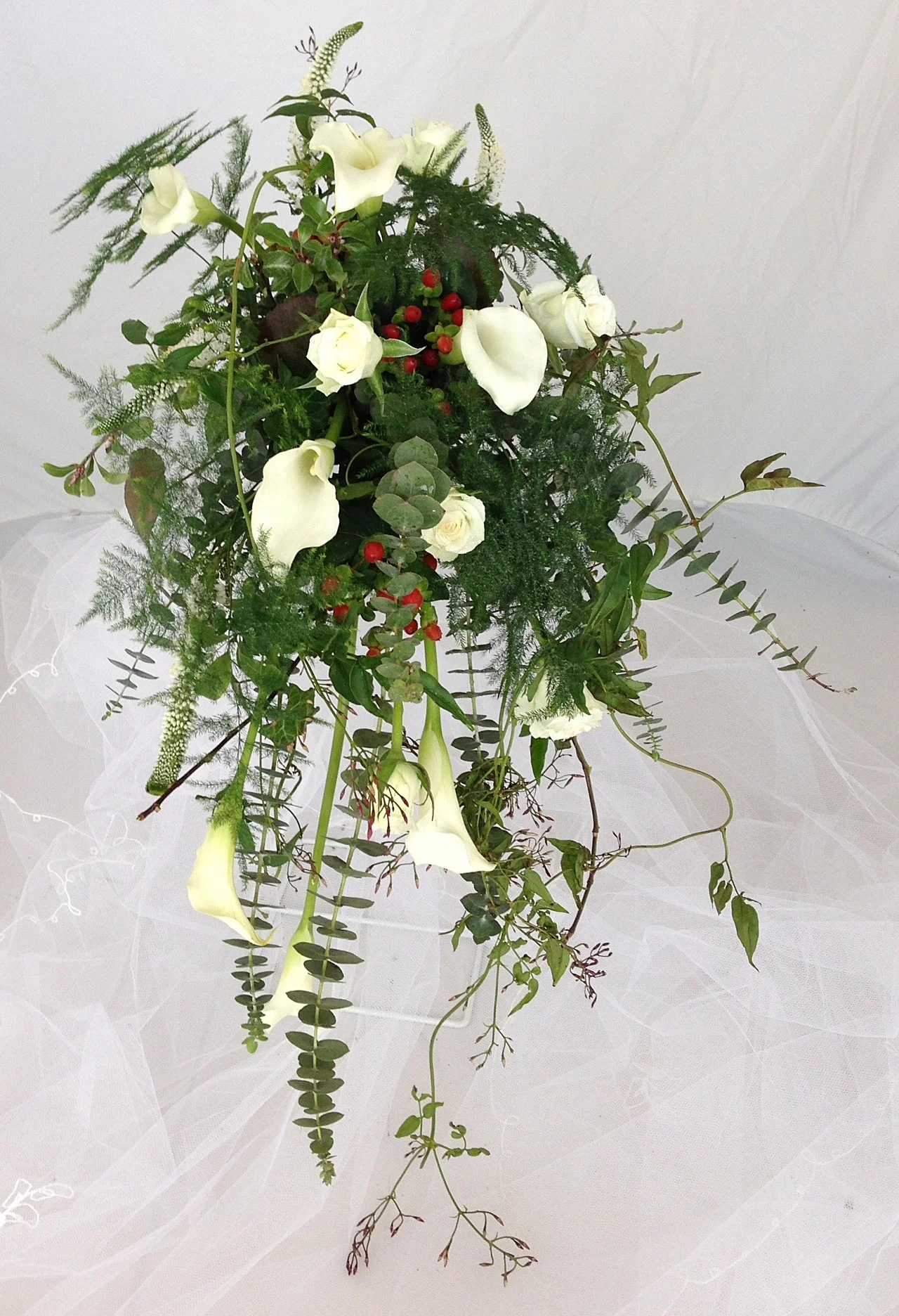 Cascading bridal bouquet in a foam holder