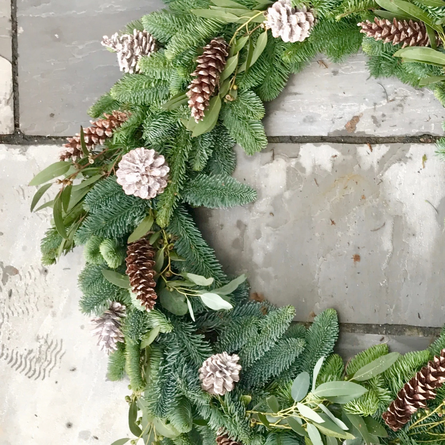 Door wreath using foliages for the garden
