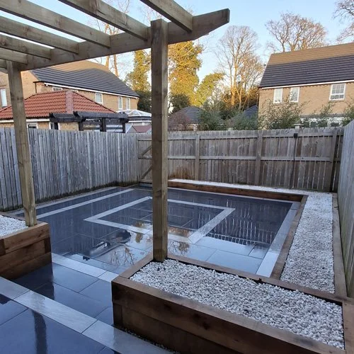 Porcelain paved, low maintenance space meeting the clients requirements.