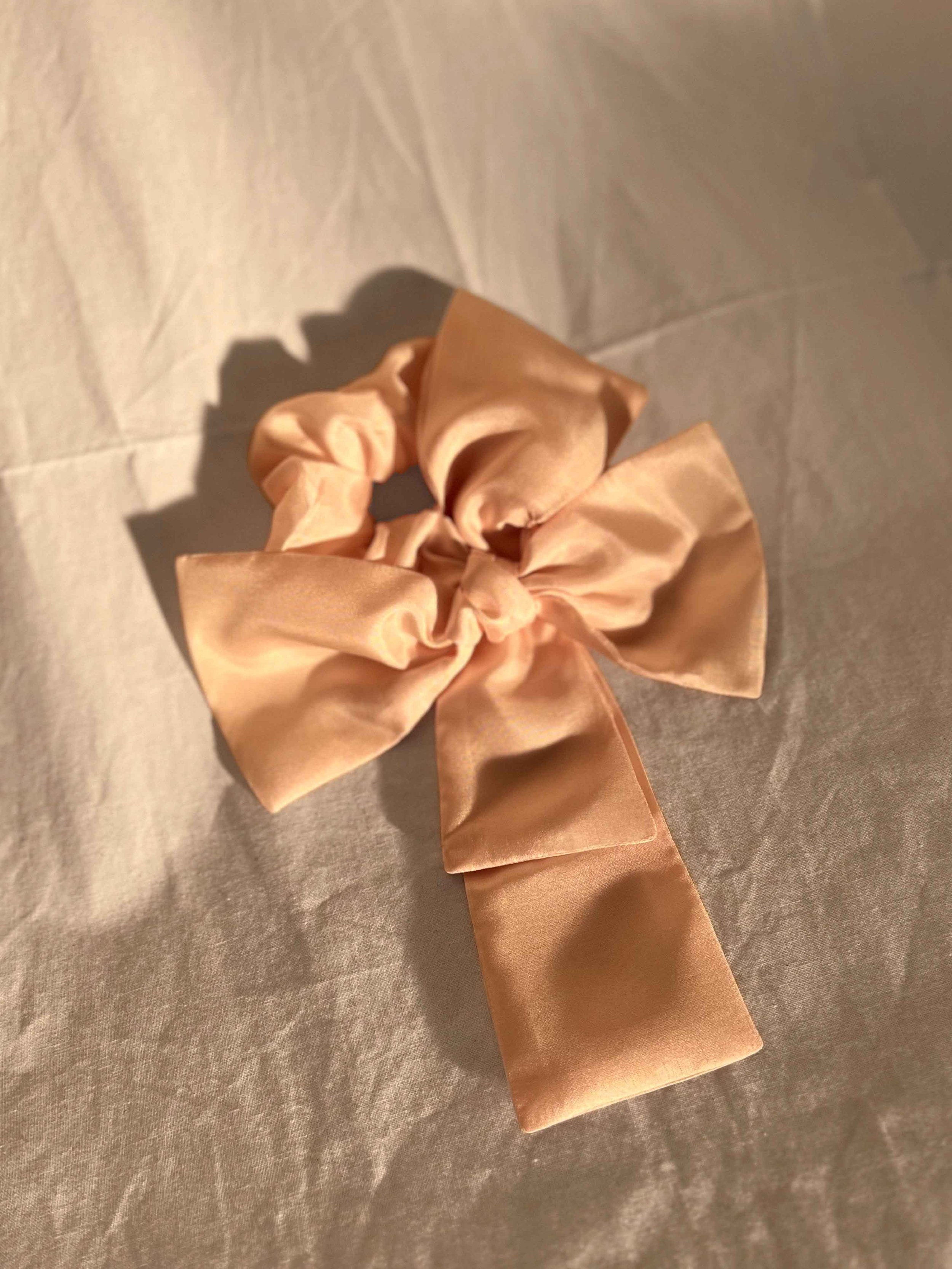 Tie Bow Hair Accessory - product shot pink.jpg