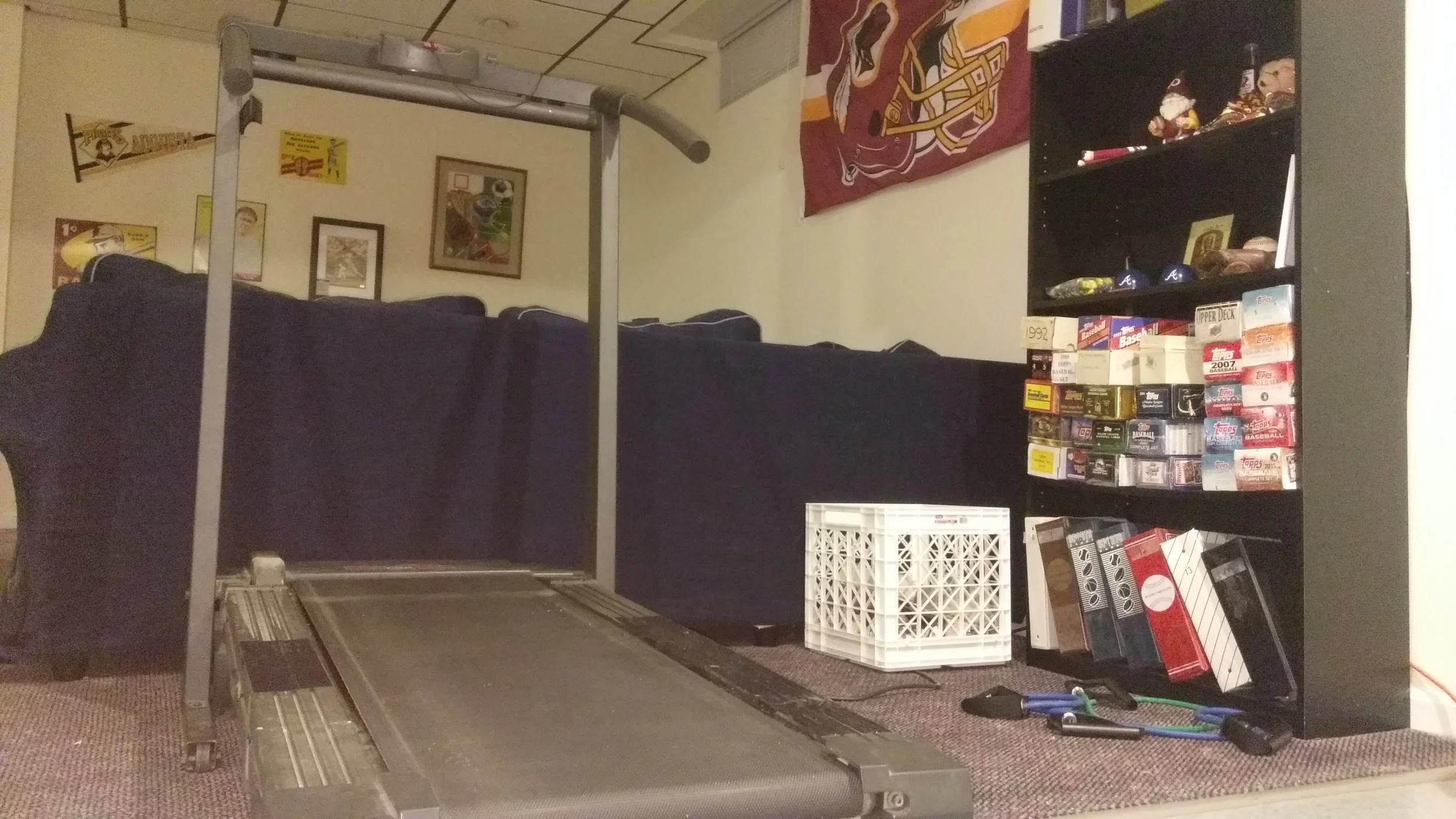 Treadmill set up in the basement. Why does this picture look like it was taken in 1985?