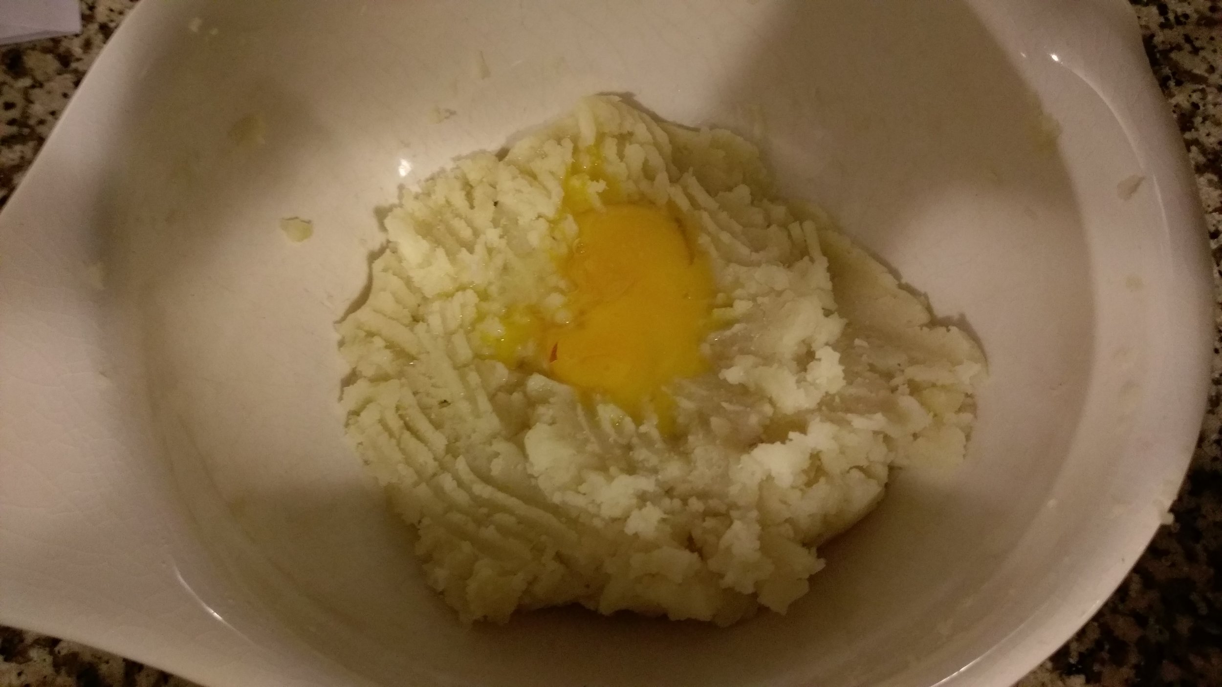 Add the egg yolks and flour