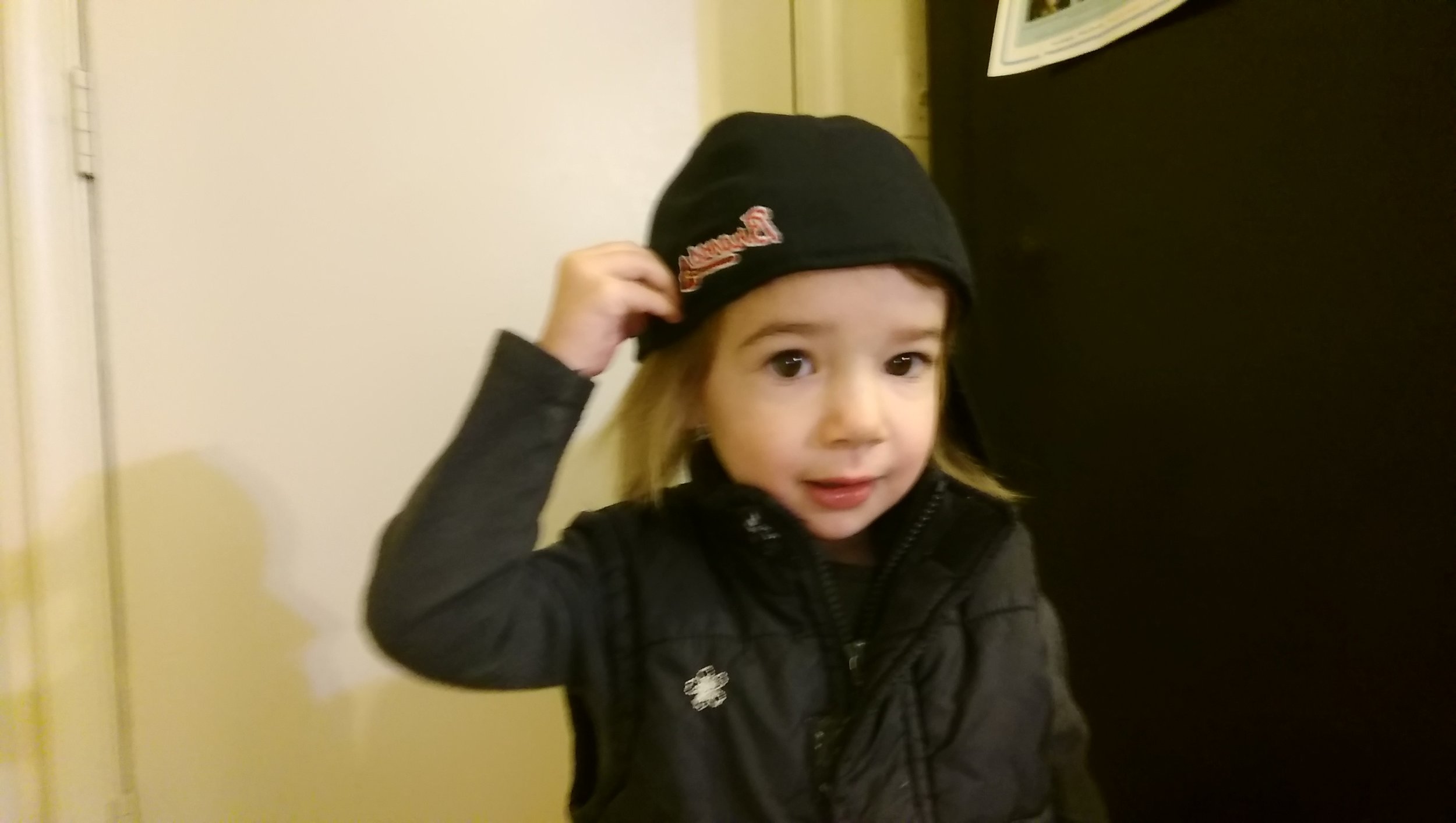 Cool kid in a baseball hat
