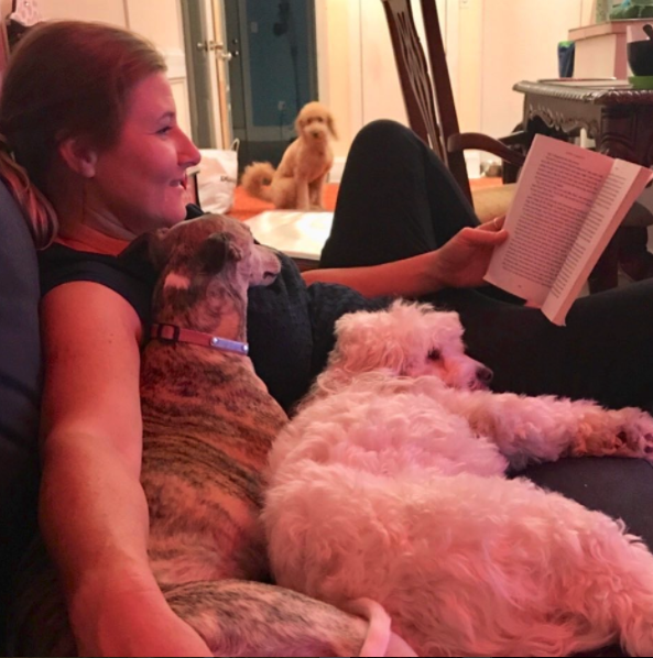 basia reading to doggies.png