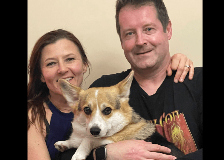 walker with corgi