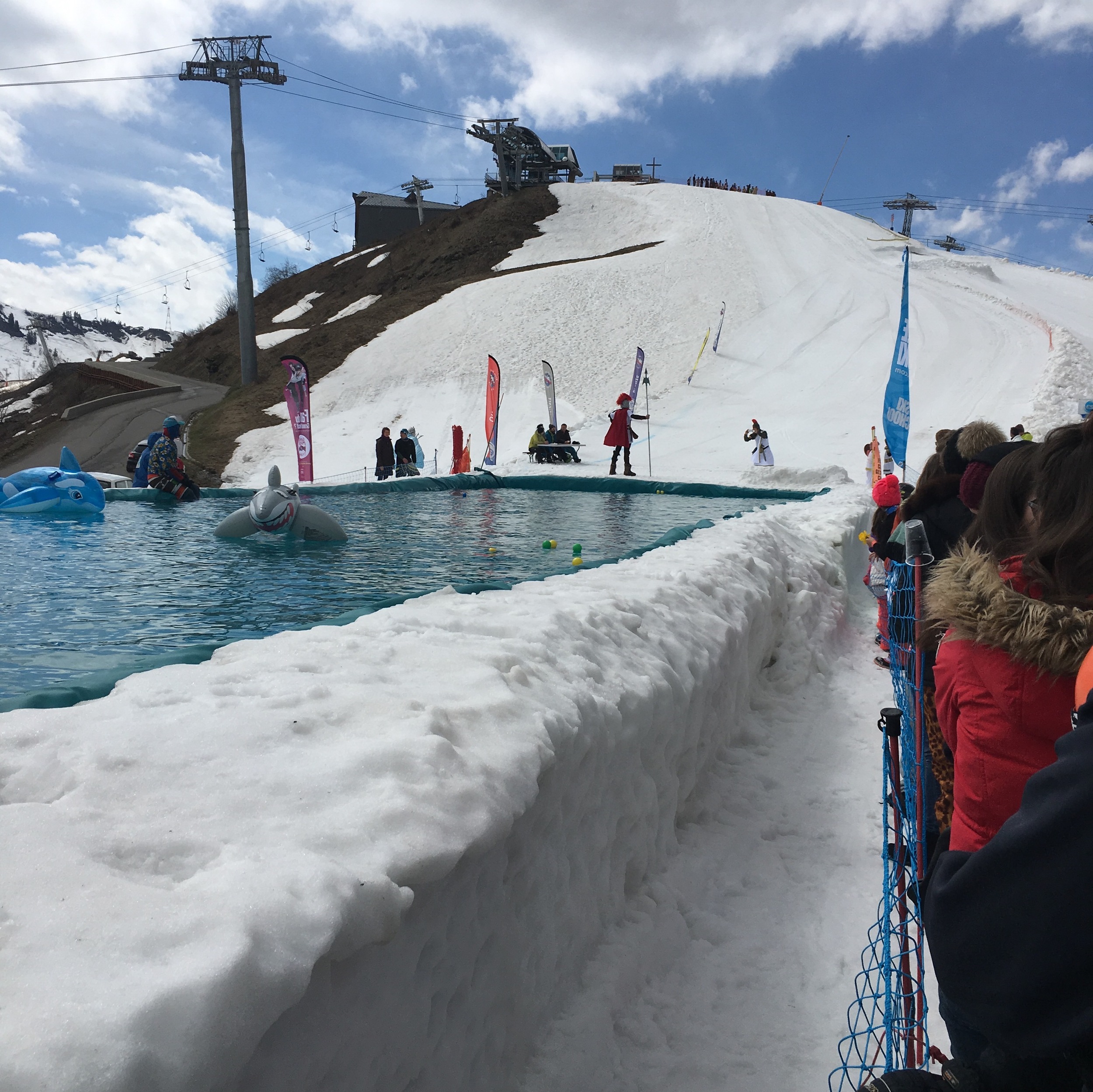 down the slope and into the pool...