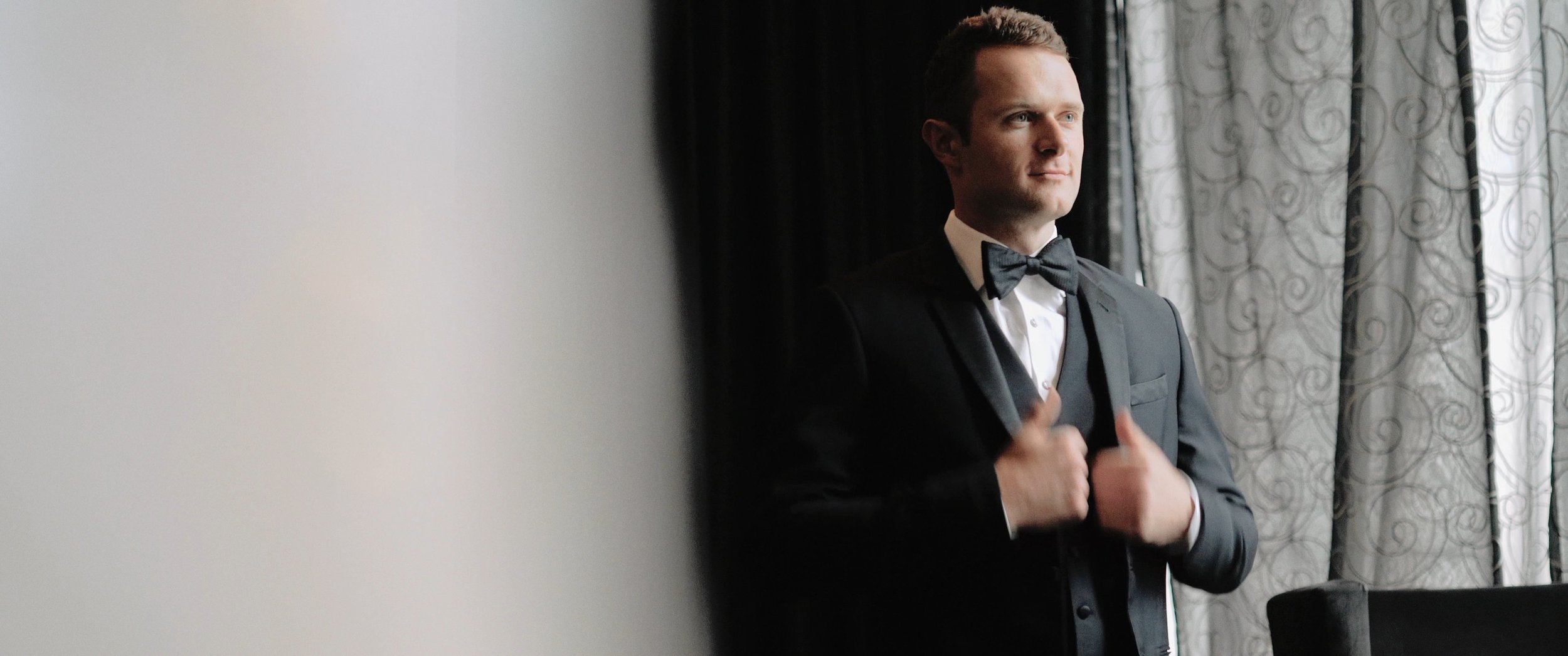 Michael suit on.jpeg