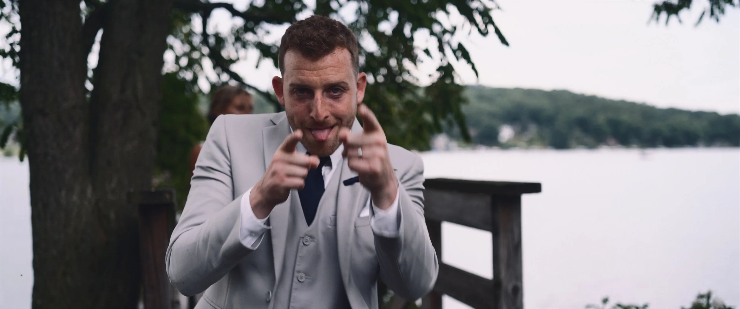 Groom pointing at camera.jpeg