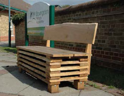 The oak bench is just outside the Bovingdon village library and the Primary School. 