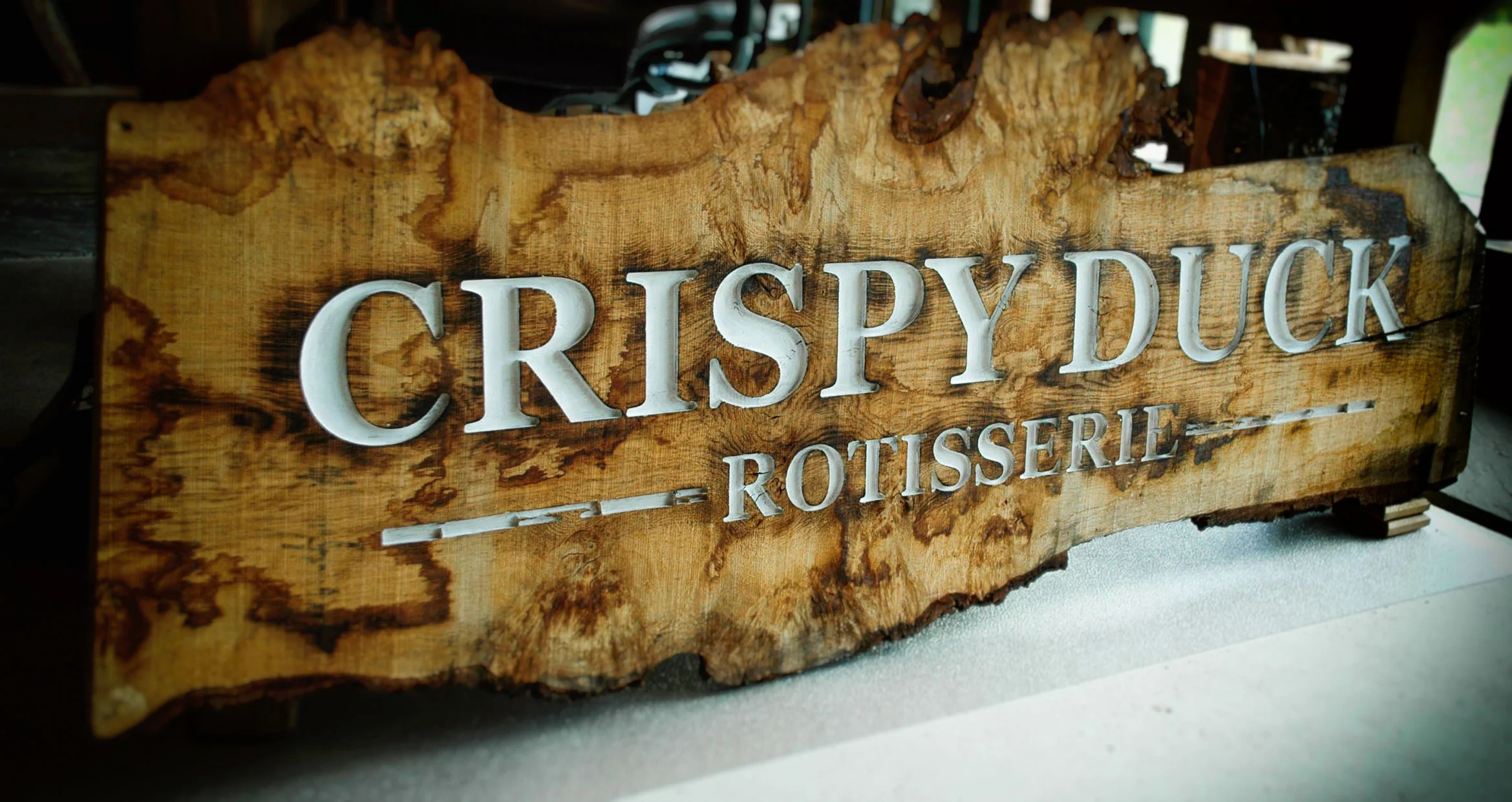 See the beautiful solid oak sign we created for Crispy Duck Rotisserie