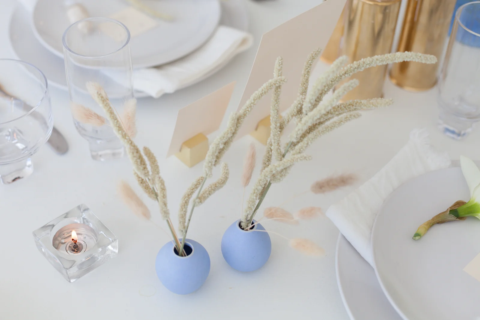 Floral styling by Timberlost featuring bud vases by Akai Ceramic Studio.