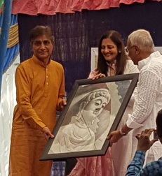 Gift of Buddha Bhagwan picture to Chandrakantbhai Vyas for the school's principal office.