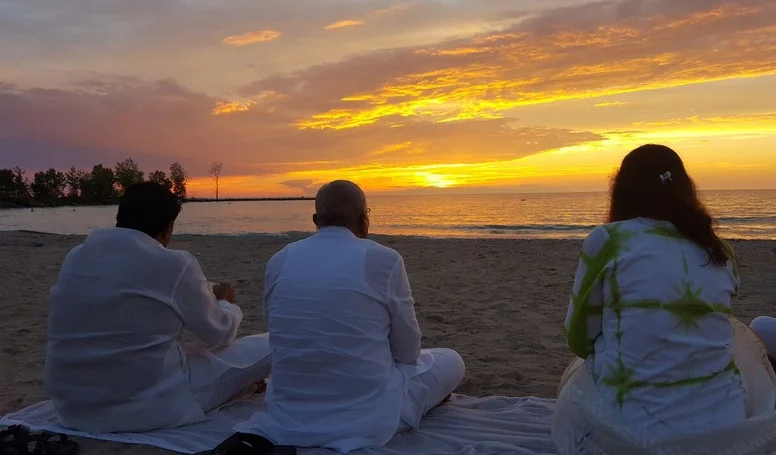 Bhaishree with Sunset.jpg