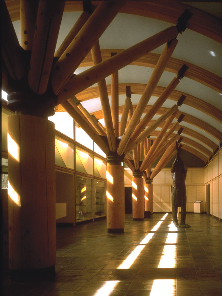 The Museum at Warm Springs lies deep within the Deschutes River Canyon where the Warm Springs People have lived for thousands of years; where the cimate is milder, the light more diffused and life more bountiful. The museum building is located in a place of encampment —a cottonwood grove beside the river— where the tribes’ traditional possessions can live with meaning. The heirlooms and artifacts held in the Museum belong to the landscape as well as the Tribes. In the high desert they are alive and their color and texture flower in the clear desert air.