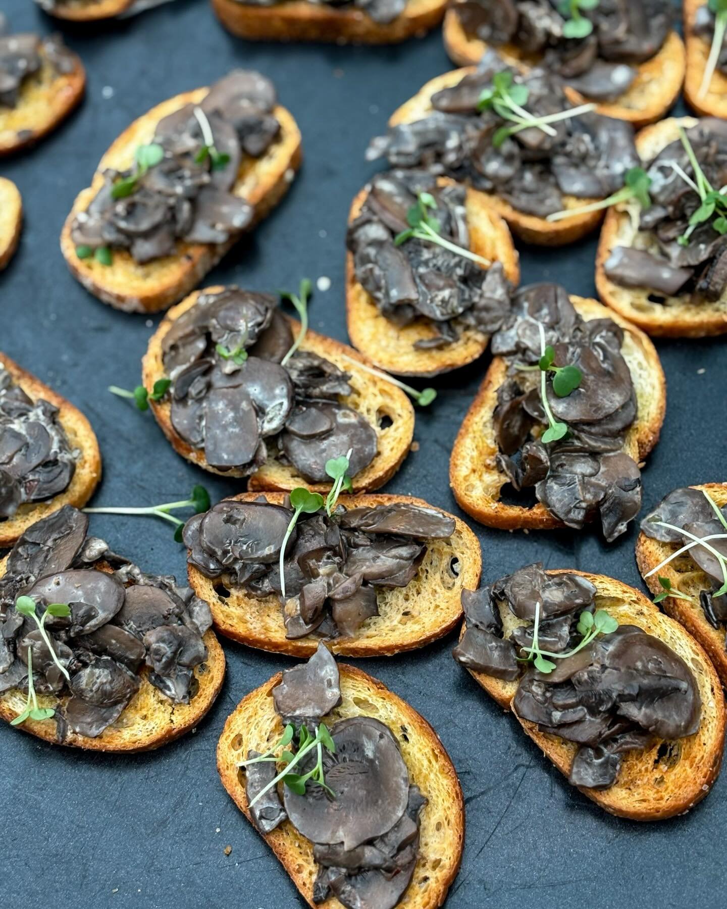 We make small bites that you and your guests will love! 

At a recent corporate party our client ordered a custom menu that included a selection of passed apps along with a hearty appetizer buffet. Pictured here: Tapas de Setas, Tartaleta de Lim&oacu