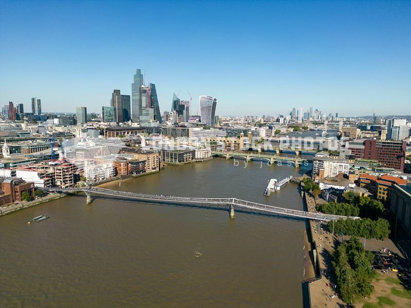  London SE1, Aug 2022 - Aerial view of the Millennium Bridge towards the City of London 