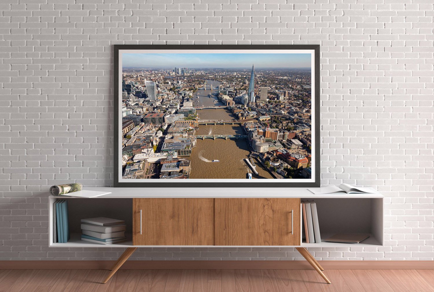  Poster of an Aerial views of London showing London skyline of the River Thames looking East 