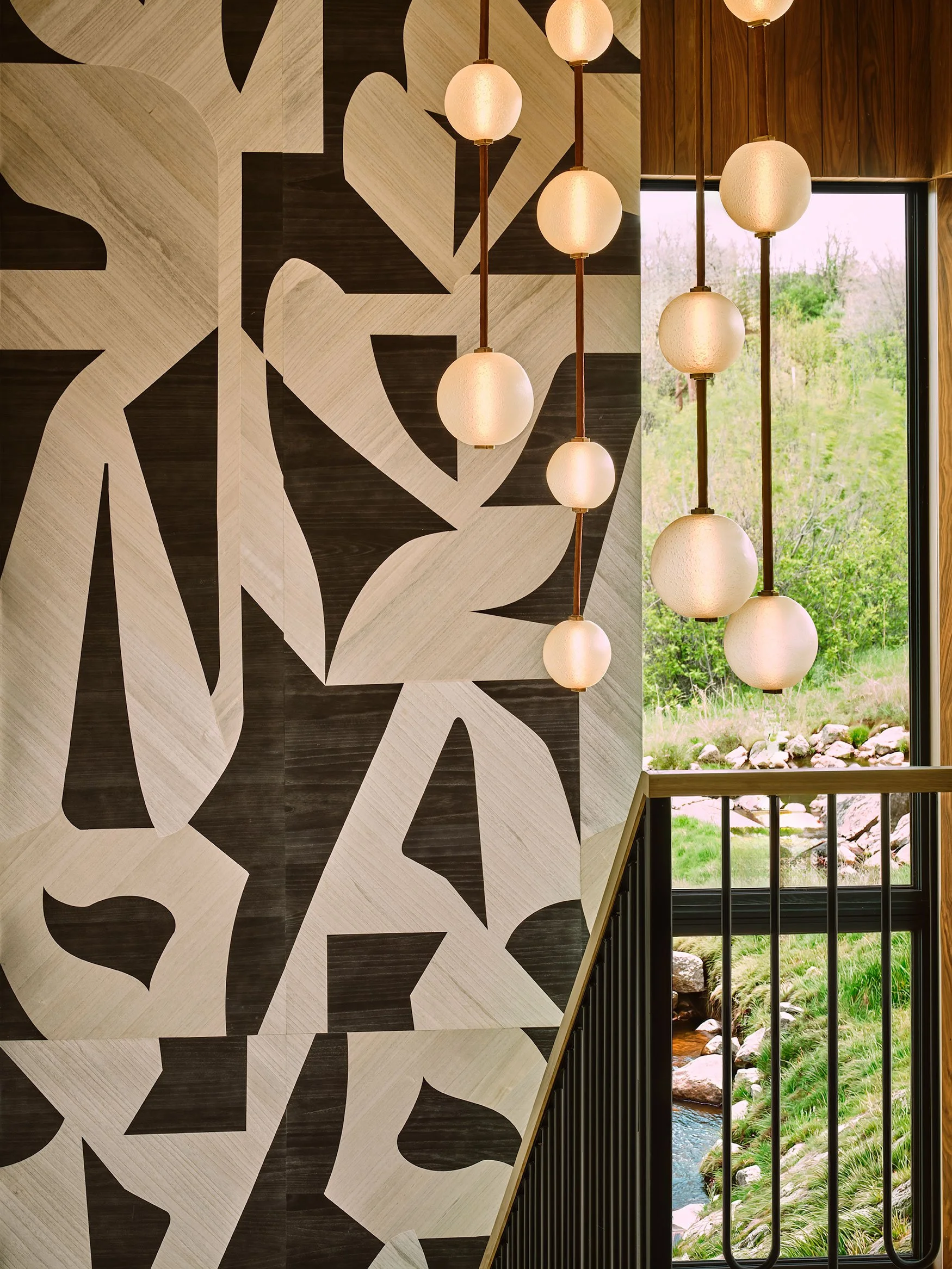 Rumor-Swain-AMR-04-23-26-Stair-Wallcovering-and-Light-Detail-Web.jpg